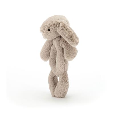 Lapin à la recherche d'un hochet